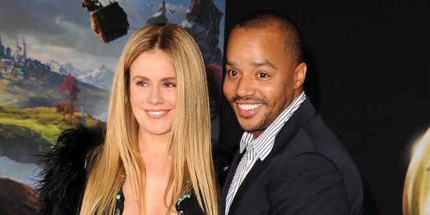 HOLLYWOOD, CA - FEBRUARY 13: Actor Donald Faison (R) and Cacee Cobb attend the world premiere of Disney's 'OZ The Great And Powerful' at the El Capitan Theatre on February 13, 2013 in Hollywood, California. (Photo by Steve Granitz/WireImage)