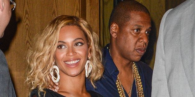 NEW YORK, NY - AUGUST 25: Singer Beyonce Knowles-Carter (L) and rapper Jay Z leave the Dream Downtown hotel on August 25, 2013 in New York City. (Photo by Ray Tamarra/Getty Images)