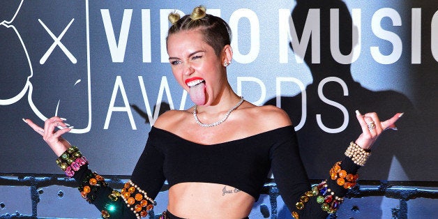 Miley Cyrus Puts on Powerful Display Wearing Black Underwear Set in  'Pre-Grammy Win' Photo - Parade