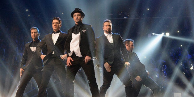 NEW YORK, NY - AUGUST 25: (L-R) Lance Bass, JC Chasez, Justin Timberlake, Joey Fatone and Chris Kirkpatrick of N Sync perform during the 2013 MTV Video Music Awards at the Barclays Center on August 25, 2013 in the Brooklyn borough of New York City. (Photo by Jeff Kravitz/FilmMagic for MTV)