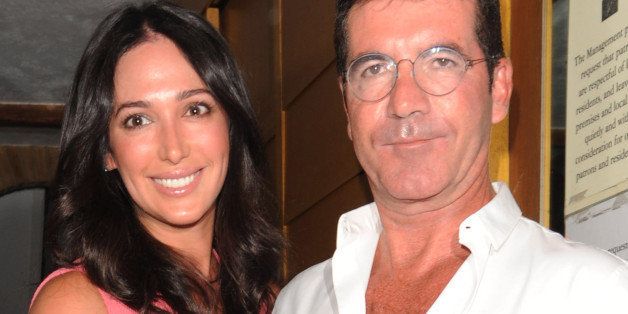 LONDON, UNITED KINGDOM - AUGUST 28: Lauren Silverman and Simon Cowell sighting at Scalini Restaurant, Chelsea on August 28, 2013 in London, England. (Photo by Alan Chapman/FilmMagic)