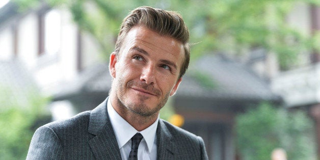 HANGZHOU, CHINA - JUNE 22: (CHINA OUT) David Beckham looks on as he visits Xijin Park on June 22, 2013 in Hangzhou, Zhejiang