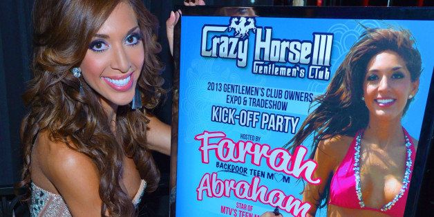 LAS VEGAS, NV - AUGUST 20: Television personality Farrah Abraham signs an autograph on a promotional poster of herself during the 2013 Gentlemen's Club EXPO & Tradeshow kick off party at the Crazy Horse III Gentlemens Club on August 20, 2013 in Las Vegas, Nevada. (Photo by Bryan Steffy/WireImage)