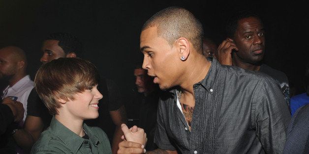 MIAMI - FEBRUARY 06: Justin Bieber and Chris Brown pose backstage at the BET-SOS Saving Ourselves Help for Haiti Benefit Concert at AmericanAirlines Arena on February 5, 2010 in Miami, Florida. (Photo by Kevin Mazur/WireImage)