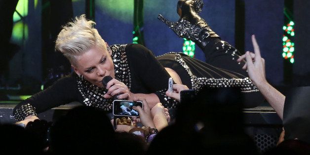 PERTH, AUSTRALIA - JUNE 25: Pink performs live for fans at Perth Arena on June 25, 2013 in Perth, Australia. (Photo by Matt Jelonek/WireImage)