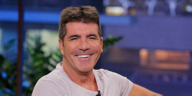 THE TONIGHT SHOW WITH JAY LENO -- Episode 4523 -- Pictured: TV personality Simon Cowell during an interview on September 6, 2013 -- (Photo by: Paul Drinkwater/NBC/NBCU Photo Bank via Getty Images)