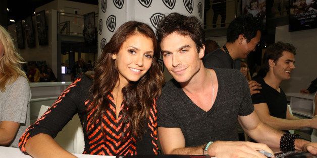 SAN DIEGO, CA - JULY 20: In this handout photo provided by WBTV, actors Nina Dobrev and Ian Somerhalder attends 'The Vampire Diaries' signing in the Warner Bros. booth during Comic-Con 2013 on July 20, 2013 in San Diego, California. (Photo by Chris FrawleyWBTV via Getty Images)