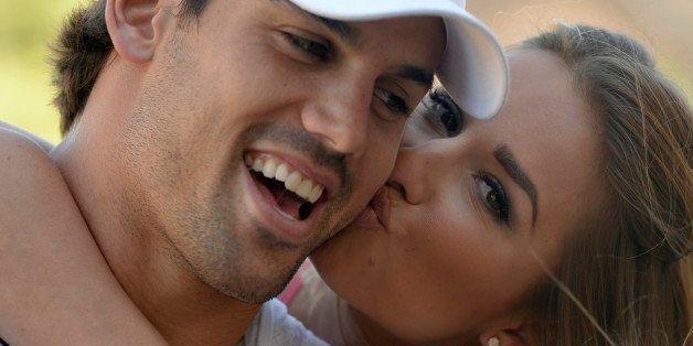 CASTLE ROCK, CO. - JULY 17: Denver Broncos Eric Decker gets a kiss on the cheek from his wife Jessie James at their home July 17, 2013. Profile story on the wide receiver. (Photo By John Leyba/The Denver Post via Getty Images)