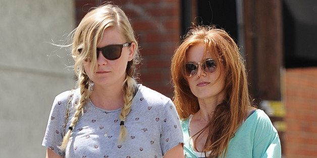 LOS ANGELES, CA - AUGUST 19: Kirsten Dunst (L) and Isla Fisher are seen on August 19, 2013 in Los Angeles, California. (Photo by Chris Wolf/FilmMagic)