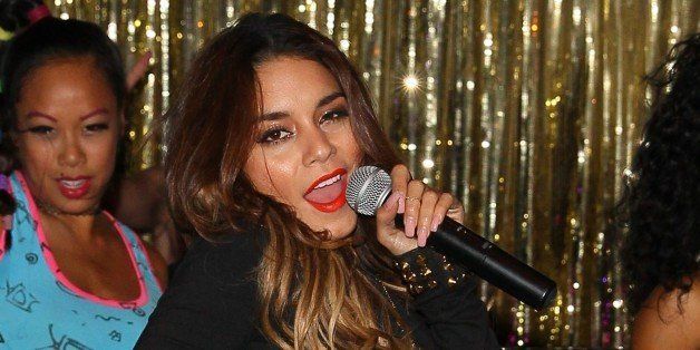 WEST HOLLYWOOD, CA - SEPTEMBER 24: Vanessa Hudgens and YLA perform at Bootsy Bellows on September 24, 2013 in West Hollywood, California. (Photo by JB Lacroix/WireImage)