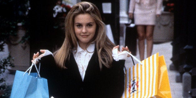 Alicia Silverstone holding shopping bags in a scene from the film 'Clueless', 1995. (Photo by Paramount Pictures/Getty Images