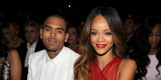 LOS ANGELES, CA - FEBRUARY 10: Chris Brown and Rihanna attend the 55th Annual GRAMMY Awards at STAPLES Center on February 10