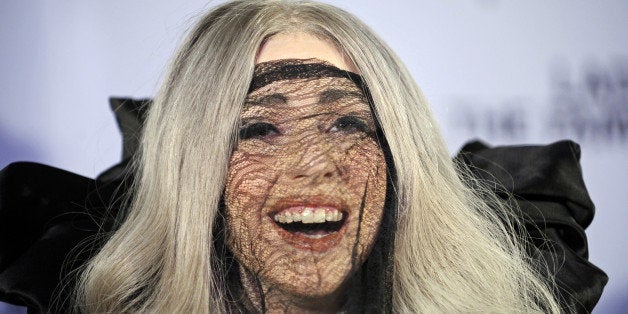 US singer Lady Gaga laughs on stage as she receives three 'Echo' music awards ahead of her concert in Berlin on May 11, 2010.