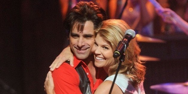 NEW YORK, NY - JULY 19:John Stamos of Jesse and the Rippers and Lori Loughlin visit 'Late Night With Jimmy Fallon' at Rockefe