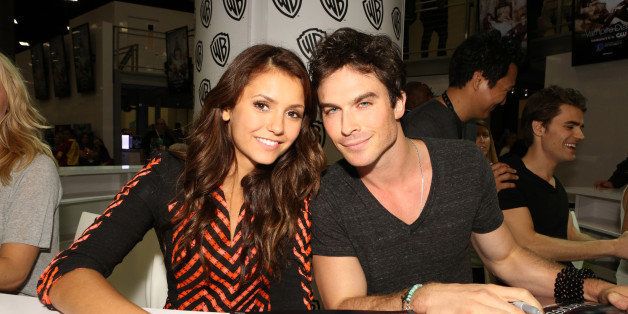 SAN DIEGO, CA - JULY 20: In this handout photo provided by WBTV, actors Nina Dobrev and Ian Somerhalder attends 'The Vampire Diaries' signing in the Warner Bros. booth during Comic-Con 2013 on July 20, 2013 in San Diego, California. (Photo by Chris FrawleyWBTV via Getty Images)