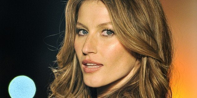 SAO PAULO, BRAZIL - OCTOBER 31: (BRAZIL OUT) Gisele Bundchen walks the runway during the Colcci show at the Sao Paulo Fashion