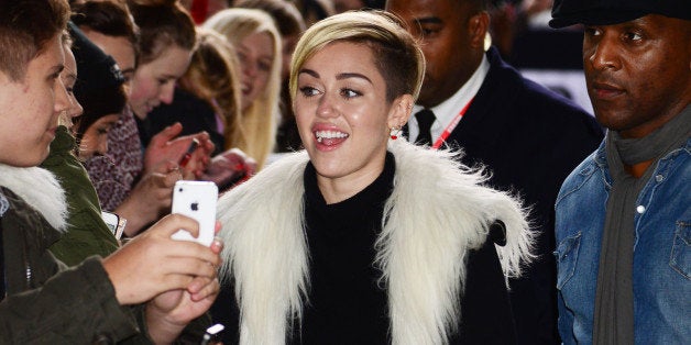 LONDON, UNITED KINGDOM - NOVEMBER 12: Miley Cyrus sighted arriving at BBC Radio One on November 12, 2013 in London, England.