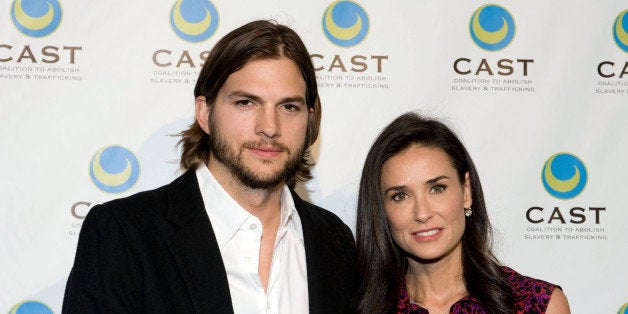 LOS ANGELES, CA - MAY 12: Actor Ashton Kutcher (L) and actress Demi Moore arrive at the Coalition to Abolish Slavery & Traff