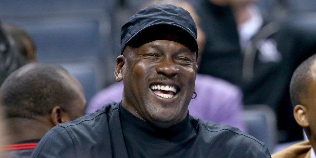 CHARLOTTE, NC - NOVEMBER 20: Michael Jordan, owner of the Charlotte Bobcats, reacts after a call during their game against the Brooklyn Nets at Time Warner Cable Arena on November 20, 2013 in Charlotte, North Carolina. NOTE TO USER: User expressly acknowledges and agrees that, by downloading and or using this photograph, User is consenting to the terms and conditions of the Getty Images License Agreement. (Photo by Streeter Lecka/Getty Images)