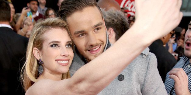 LOS ANGELES, CA - NOVEMBER 24: Actress Emma Roberts (L) and Liam Payne attend the 2013 American Music Awards at Nokia Theatre L.A. Live on November 24, 2013 in Los Angeles, California. (Photo by Christopher Polk/AMA2013/Getty Images for DCP)