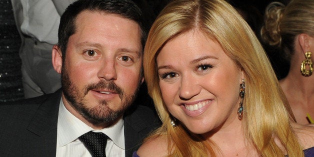 LAS VEGAS, NV - APRIL 07: Singer Kelly Clarkson (R) and Brandon Blackstock in the audience during the 48th Annual Academy of