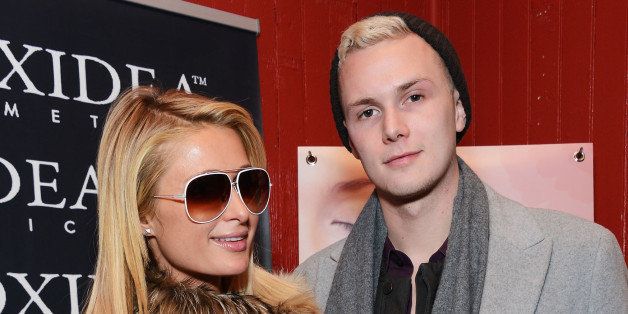 PARK CITY, UT - JANUARY 19: Paris Hilton and Barron Hilton II attend Day 2 of the Kari Feinstein Style Lounge on January 19, 2013 in Park City, Utah. (Photo by Amanda Edwards/Getty Images for KFSL)