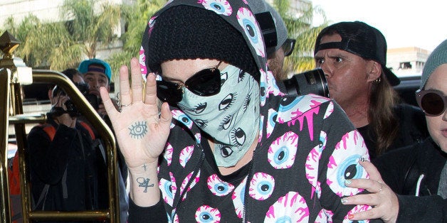 LOS ANGELES, CA - NOVEMBER 26: Ke$ha is seen arriving at LAX airport on November 26, 2013 in Los Angeles, California. (Phot