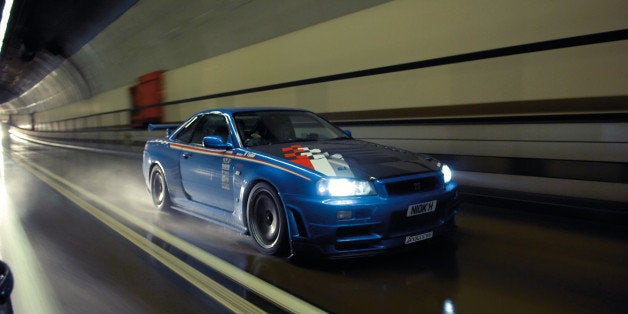 UNITED KINGDOM - OCTOBER 25: A modified Nissan Skyline car, driving through a tunnel. During a shoot for Fast Car Magazine, October 25, 2006. (Photo by Chris Wallbank/Fast Car Magazine via Getty Images)