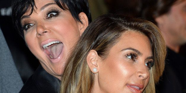 LAS VEGAS, NV - OCTOBER 26: Television personalities Kris Jenner (L) and Kim Kardashian arrive at the Tao Nightclub at The Venetian Las Vegas to celebrate Kardashian's 33rd birthday on October 26, 2013 in Las Vegas, Nevada. (Photo by Ethan Miller/Getty Images)
