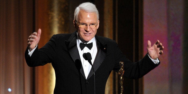 HOLLYWOOD, CA - NOVEMBER 16: Honoree Steve Martin accepts honorary award onstage during the Academy of Motion Picture Arts a