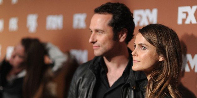 NEW YORK, NY - MARCH 28: Actors Matthew Rhys and Keri Russell attend the 2013 FX Upfront Bowling Event at Luxe at Lucky Strike Lanes on March 28, 2013 in New York City. (Photo by Dimitrios Kambouris/Getty Images)