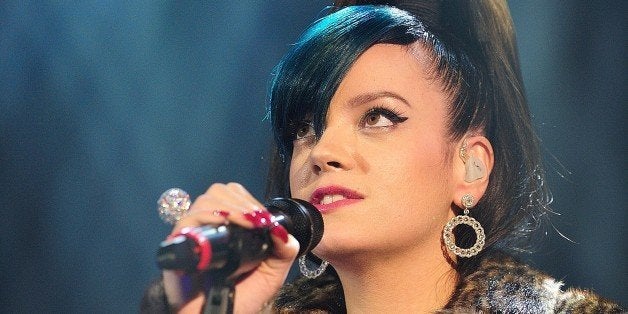 LONDON, UNITED KINGDOM - DECEMBER 19: Lily Allen performs on stage at the 'Under 1 Roof' concert in aid of Kids Company at Ha