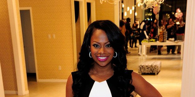 LAS VEGAS, NV - NOVEMBER 07: Television personality Kandi Burruss poses during boutique opening at Town Square on November 7, 2013 in Las Vegas, Nevada. (Photo by Steven Lawton/FilmMagic)