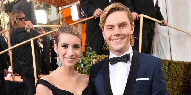 BEVERLY HILLS, CA - JANUARY 12: 71st ANNUAL GOLDEN GLOBE AWARDS -- Pictured: (l-r) Actors Emma Roberts and Evan Peters arrive to the 71st Annual Golden Globe Awards held at the Beverly Hilton Hotel on January 12, 2014 -- (Photo by Alberto Rodriguez/NBC/NBC via Getty Images)