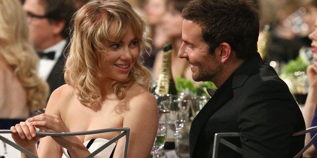 LOS ANGELES, CA - JANUARY 18: Actor Bradley Cooper (R) and model Suki Waterhouse attend 20th Annual Screen Actors Guild Awards at The Shrine Auditorium on January 18, 2014 in Los Angeles, California. (Photo by Christopher Polk/WireImage)
