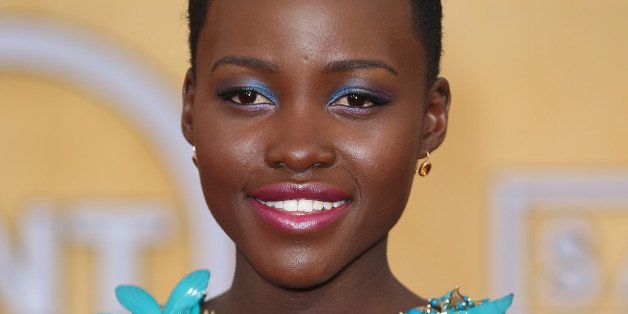 LOS ANGELES, CA - JANUARY 18: Lupita Nyong'o arrives at the 20th Annual Screen Actors Guild Awards at the Shrine Auditorium on January 18, 2014 in Los Angeles, California. (Photo by Dan MacMedan/WireImage)