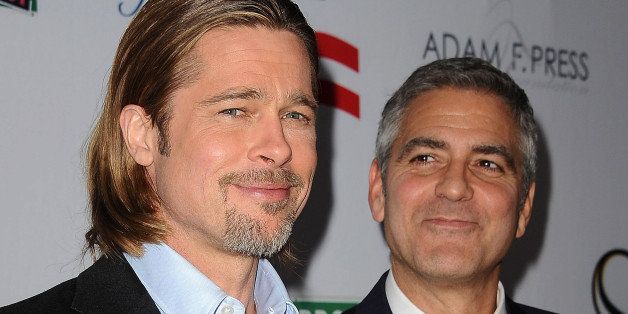 LOS ANGELES, CA - MARCH 03: Actors Brad Pitt (L) and George Clooney attend the west coast premiere of '8' at The Wilshire Ebell Theatre on March 3, 2012 in Los Angeles, California. (Photo by Jason LaVeris/FilmMagic)