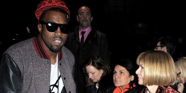 PARIS - MARCH 08: Kanye West and Anna Wintour attend the Givenchy Ready-to-Wear A/W 2009 fashion show during Paris Fashion Week at Carreau du Temple on March 8, 2009 in Paris, France. (Photo by Dominique Charriau/WireImage)