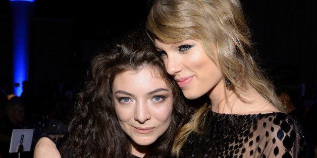 BEVERLY HILLS, CA - JANUARY 25: Recording artists Lorde (L) and Taylor Swift attend the 56th annual GRAMMY Awards Pre-GRAMMY Gala and Salute to Industry Icons honoring Lucian Grainge at The Beverly Hilton on January 25, 2014 in Beverly Hills, California. (Photo by Larry Busacca/Getty Images for NARAS)