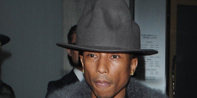 LONDON, UNITED KINGDOM - FEBRUARY 05: Pharell Williams leaving Nobu Restaurant on February 5, 2014 in London, England. (Photo