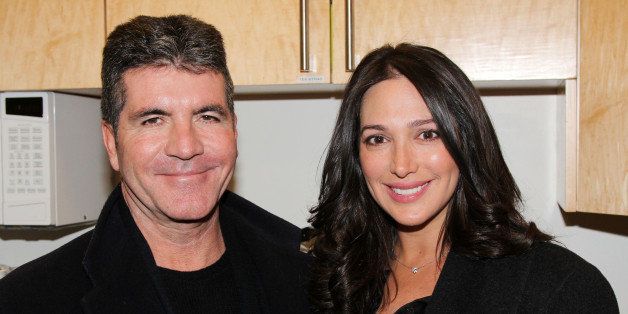 NEW YORK, NY - JANUARY 25: (EXCLUSIVE COVERAGE) Simon Cowell and partner Lauren Silverman pose backstage at 'BEAUTIFUL- The Carole King Musical' on Broadway at The Stephen Sondheim Theater on January 25, 2014 in New York City. (Photo by Bruce Glikas/FilmMagic)