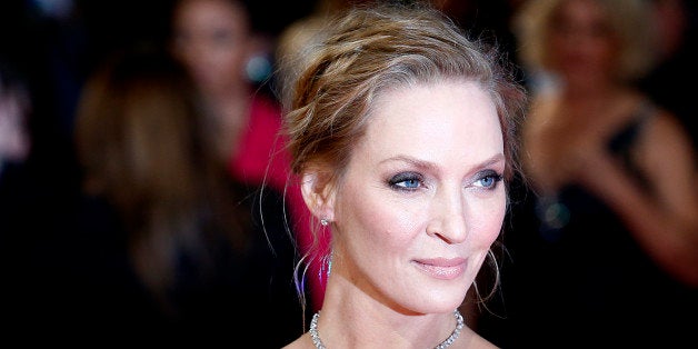 US actress Uma Thurman arrives on the red carpet for the BAFTA British Academy Film Awards at the Royal Opera House in London on February 16, 2014. AFP PHOTO / ANDREW COWIE (Photo credit should read ANDREW COWIE/AFP/Getty Images)