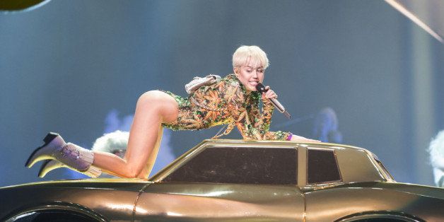 VANCOUVER, BC - FEBRUARY 14: American singer Miley Cyrus opens her 'Bangerz Tour' at Pepsi Live at Rogers Arena on February 14, 2014 in Vancouver, Canada. (Photo by Phillip Chin/Getty Images)