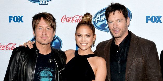 WEST HOLLYWOOD, CA - FEBRUARY 21: (L-R) 'American Idol' judges musician Keith Urban, actress/singer Jennifer Lopez and musician Harry Connick Jr. arrive at Fox's 'American Idol Xlll' Finalists Party at Fig and Olive on February 20, 2014 in West Hollywood, California. (Photo by Kevin Winter/Getty Images)