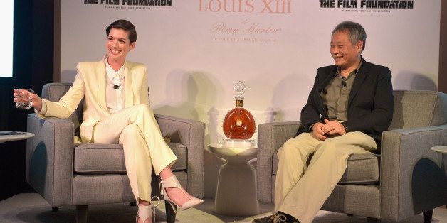 BEVERLY HILLS, CA - FEBRUARY 19: Actress Anne Hathaway and director Ang Lee speak at LOUIS XIII and The Film Foundation Creative Encounter at Charles Aidikoff Screening Room on February 19, 2014 in Beverly Hills, California. (Photo by Charley Gallay/Getty Images for LOUIS XIII)