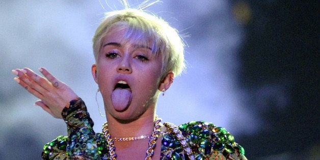 OAKLAND, CA - FEBRUARY 24: Miley Cyrus performs part of her Bangerz Tour at ORACLE Arena on February 24, 2014 in Oakland, California. (Photo by Tim Mosenfelder/Getty Images)