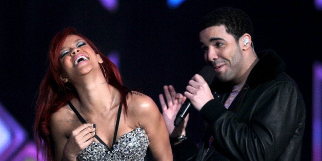 LOS ANGELES, CA - FEBRUARY 20: Singer Rihanna (L) and rapper Drake perform during the 2011 NBA All-Star game halftime show a