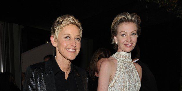 Comedian and Oscars host Ellen DeGeneres (L) arrives with Portia de Rossi at the Governor's Ball following the 86th Academy Awards on March 2nd, 2014 in Hollywood, California. AFP PHOTO / VALERIE MACON (Photo credit should read VALERIE MACON/AFP/Getty Images)