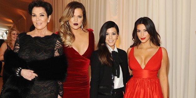 WEST HOLLYWOOD, CA - MARCH 02: (L-R) Kris Jenner, Khloe Kardashian, Kourtney Kardashian and Kim Kardashian attend the 22nd Annual Elton John AIDS Foundation Academy Awards viewing party with Chopard at the City of West Hollywood Park on March 2, 2014 in West Hollywood, California. (Photo by Stefanie Keenan/Getty Images for Chopard)