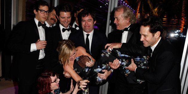 WEST HOLLYWOOD, CA - MARCH 02: (EXCLUSIVE ACCESS, SPECIAL RATES APPLY) (L-R) Actors Andy Samberg, Nick Offerman, Megan Mullally (in front, crouching), Adam Scott, Amy Poehler (being held), Bill Hader, Bill Murray, and Paul Rudd attend the 2014 Vanity Fair Oscar Party Hosted By Graydon Carter on March 2, 2014 in West Hollywood, California. (Photo by Jeff Vespa/VF14/WireImage)